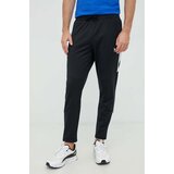 Under Armour Hlače za trening Tricot za muškarce, boja: crna, s aplikacijom | shoptok.hr