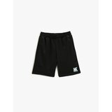 Koton Shorts - Black - Normal Waist | ePonuda.com