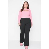 Trendyol curve black flare fit knitted trousers Cene