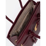 Shelvt Burgundy handbag with a decorative buckle in gold | ePonuda.com