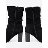 Shelvt Black ankle boots with a ruffled upper | Shoptok.si