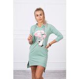 Kesi Dress with a longer back and a colorful dark mint print Cene