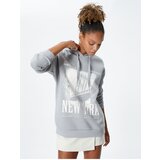 Koton Hooded Sweatshirt with a slogan printed, relaxed fit and long sleeve. Cene