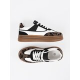 Shelvt Black and white sneakers with leopard print inserts | Shoptok.si