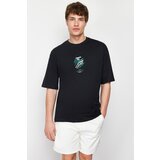 Trendyol men's black oversize/wide-fit 100% cotton ruffle text print t-shirt Cene