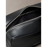 Calvin Klein Toaletna torbica zlata / črna | Shoptok.si