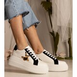 Gemre White and black sneakers decorated with glitter and a star Taleda | shoptok.hr