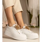 Gemre White sneakers adorned with a butterfly and rhinestones Kariba | ePonuda.com