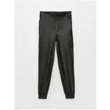 LC Waikiki Girls' Leather-Look Jogger Pants with Elastic Waist.