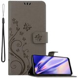 Cadorabo Samsung Galaxy A21 v klasična črna - ovitek v cvetličnem dizajnu z magnetnim zapiranjem, stoječo funkcijo in režami za kartice, (20566793) | Shoptok.si