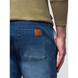 Ombre Men's denim joggers with asymmetrical stitching - blue | Shoptok.si