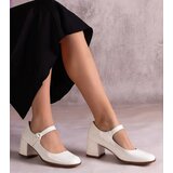 D/CEO Black pumps on a low wedge heel Chantal Cene