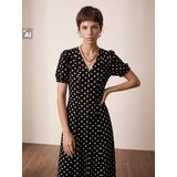 Sinsay Maxi haljina na točkice s viskozom i udjelom lana | shoptok.hr