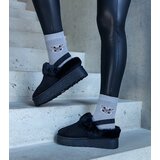 Gemre Black platform slippers decorated with fur and with an elastic band at the heel Frank Cene