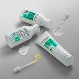 Redken Acidic Bonding Curls njega bez ispiranja za regeneraciju za kovrčavu kosu 250 ml | shoptok.hr
