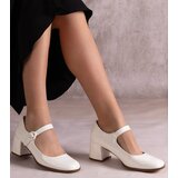 Gemre White pumps with a strap on a block heel lyraa | ePonuda.com