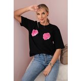 Kesi Cotton blouse with a floral print in black Cene