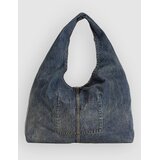 Levi's Emerson Shoulder Bag laid in the meadow | Shoptok.si