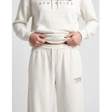 New Balance Spodnji deli trenirke TRACKSIDE FLEECE PANT Bež | Shoptok.si