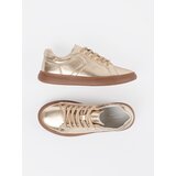 Sergio Leone s gold leather sneakers | ePonuda.com