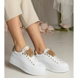 Gemre White and gold sneakers adorned with a butterfly with rhinestones Kariba | Shoptok.si