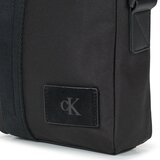 Calvin Klein Jeans Torbice CANVAS MIX REPORTER Črna | Shoptok.si
