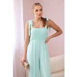 Kesi Waisted jumpsuit with a pleated mint top Cene