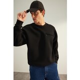 Trendyol Black Men's Oversized Crew Neck Long Sleeve Zippered Pocket Detailed Sweatshirt with a Soft Pile inside.