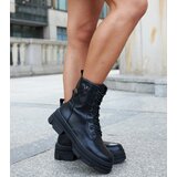 Gemre Black insulated boots with a safety pin Saavedra | Shoptok.si