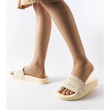 Gemre Ernest's beige slides embellished with ruching | Shoptok.si