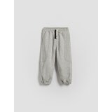 Reserved Pamučne jogger hlače - svijetlo siva | shoptok.hr