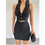 Modamorfo Two-piece Set with a Vest and a Striped Skirt