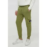 Calvin Klein Jeans Bombažen spodnji del trenirke zelena barva