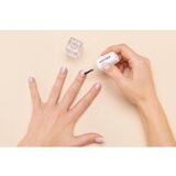Notino Nail Care Strengthening Vitamin Base Coat negovalni lak za nohte z vitamini A, C, E 10 ml | Shoptok.si