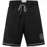 Mitchell & Ness Športne hlače 'GAME DAY 2.0' črna / bela