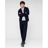 Lacoste Pantalon de survêtement en molleton tapered fit Tamno plava | shoptok.hr