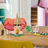 Lego LEGO® Wicked - Glinda in Elphaba obiščeta Munchkinland (75690) | Shoptok.si
