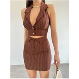 Modamorfo Two-piece Set with a Vest and a Striped Skirt
