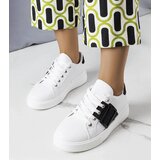 Gemre White sneakers adorned with a black buckle Erin Cene