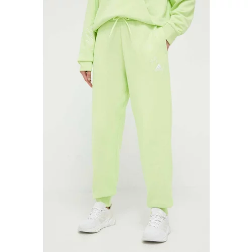 Adidas Bombažne hlače zelena barva