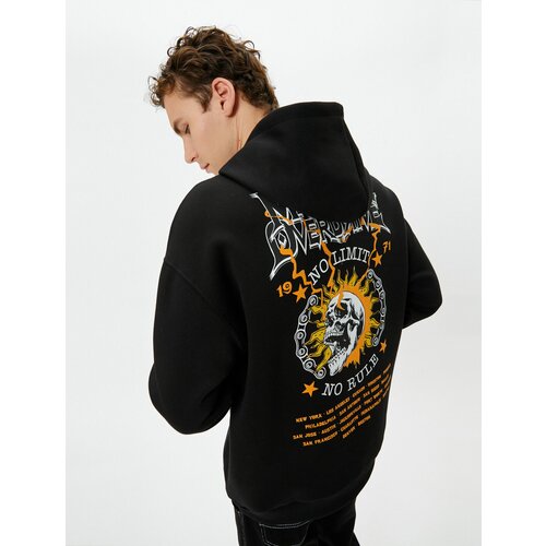 Koton Oversize Hoodie with Skull Themed Slogan Printed on the Back Cene