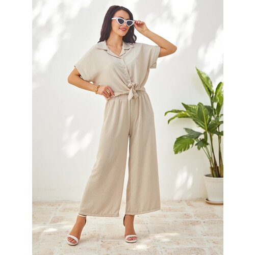 Resti Women's set with a tied short-sleeve shirt and flared pants with rhinestones Cijene