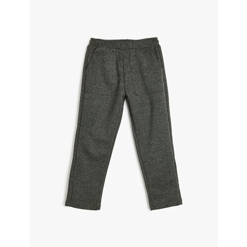 Koton basic sweatpants with pocket detail and elastic waist Slike