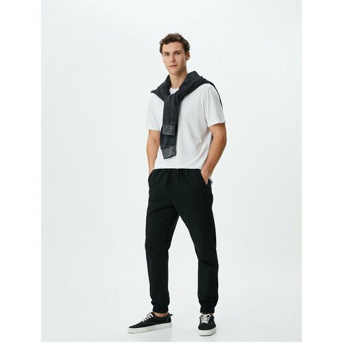 Koton Jogger Trousers with Lace Waist Slim Fit Pocket Detail Cene