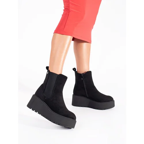 Shelvt Black suede Chelsea boots on a wedge