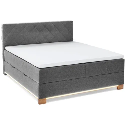 Meise Möbel Sivi boxspring krevet s prostorom za odlaganje 180x200 cm Messina –