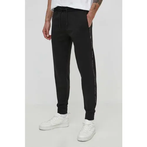 Calvin Klein Jeans Spodnji del trenirke črna barva, J30J325494