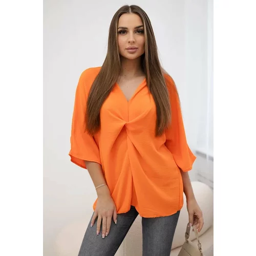 Kesi Oversized blouse with an orange neckline