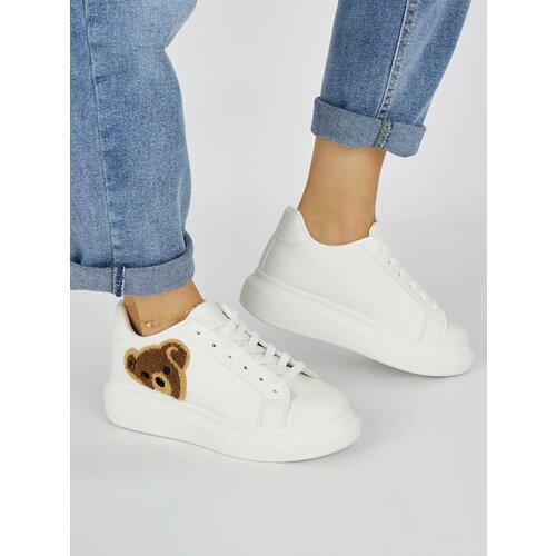 Shelvt White women's sports shoes with a teddy bear Cijene