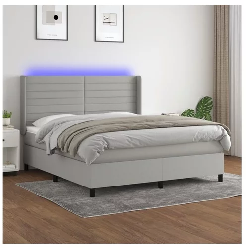 Box spring postelja z vzmetnico LED sv. siva 160x200 cm blago